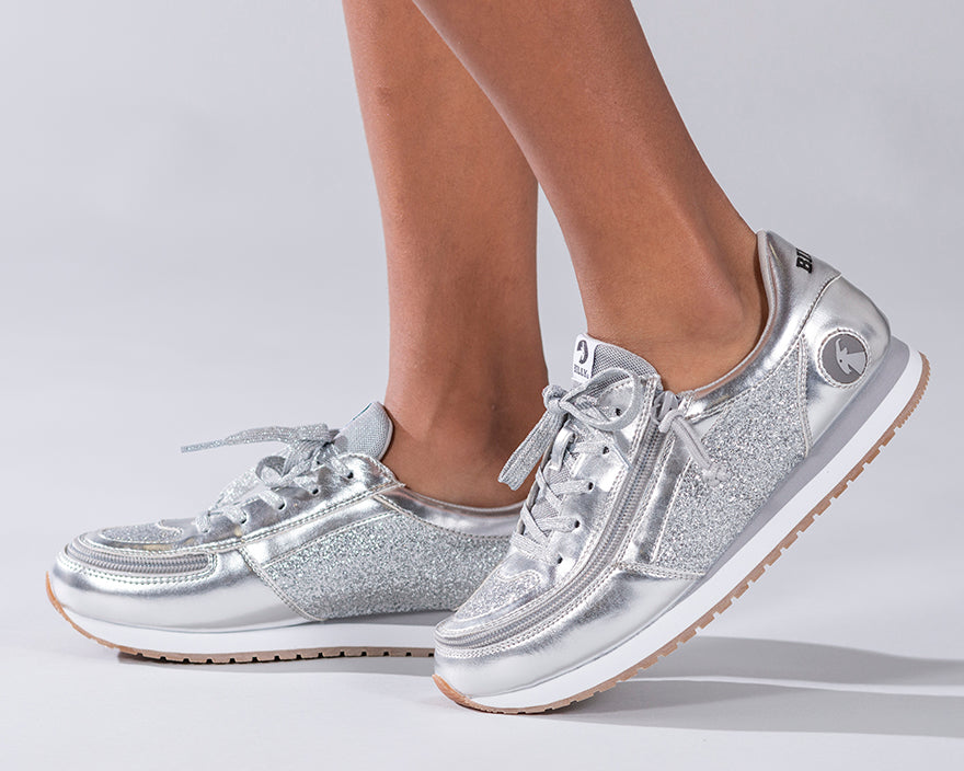 Kid's Silver BILLY Joggers, zipper shoes, like velcro, that are adaptive, accessible, inclusive and use universal design to accommodate an afo. Footwear is medium and wide width, M, D and EEE, are comfortable, and come in toddler, kids, mens, and womens sizing.
