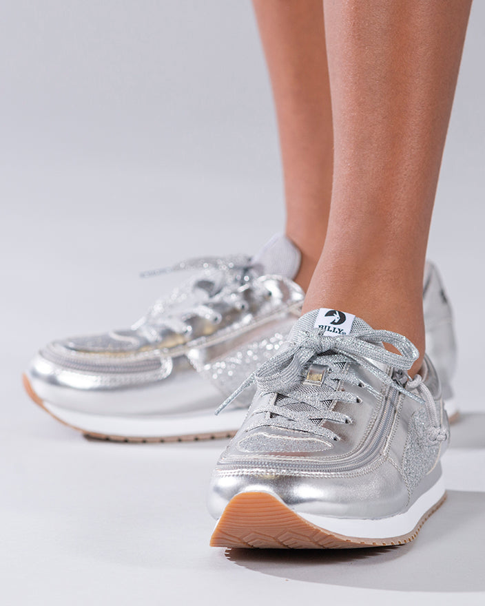 Kid's Silver BILLY Joggers, zipper shoes, like velcro, that are adaptive, accessible, inclusive and use universal design to accommodate an afo. Footwear is medium and wide width, M, D and EEE, are comfortable, and come in toddler, kids, mens, and womens sizing.