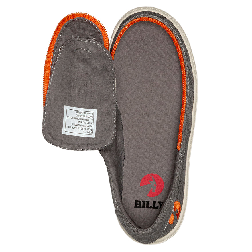 Kid's Grey/Orange BILLY Classic Lace Lows, zipper shoes, like velcro, that are adaptive, accessible, inclusive and use universal design to accommodate an afo. Footwear is medium and wide width, M, D and EEE, are comfortable, and come in toddler, kids, mens, and womens sizing.