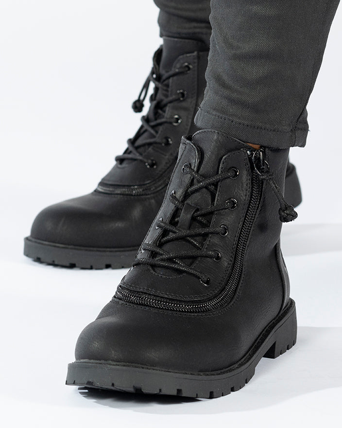 Kid's Black BILLY Boots, zipper shoes, like velcro, that are adaptive, accessible, inclusive and use universal design to accommodate an afo. BILLY Footwear comes in medium and wide width, M, D and EEE, are comfortable, and come in toddler, kids, mens, and womens sizing.