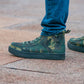 Men's Green Camo BILLY Classic Lace Highs, zipper shoes, like velcro, that are adaptive, accessible, inclusive and use universal design to accommodate an afo. Footwear is medium and wide width, M, D and EEE, are comfortable, and come in toddler, kids, mens, and womens sizing.