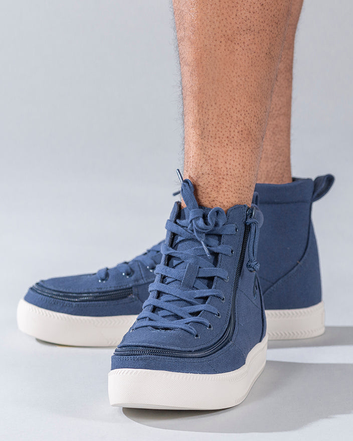Men's Navy BILLY Classic Lace Highs, zipper shoes, like velcro, that are adaptive, accessible, inclusive and use universal design to accommodate an afo. Footwear is medium and wide width, M, D and EEE, are comfortable, and come in toddler, kids, mens, and womens sizing.