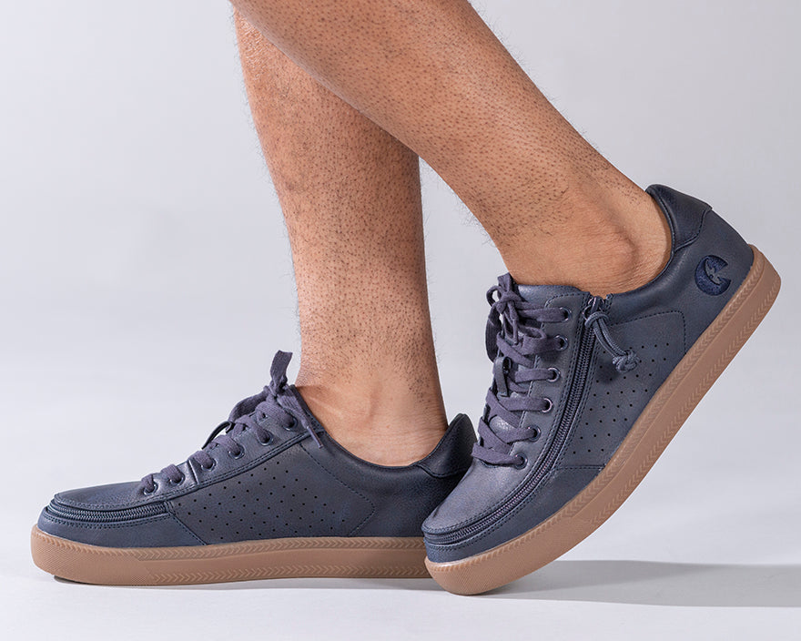 Men's Navy BILLY Sneaker Lows, zipper shoes, like velcro, that are adaptive, accessible, inclusive and use universal design to accommodate an afo. Footwear is medium and wide width, M, D and EEE, are comfortable, and come in toddler, kids, mens, and womens sizing.