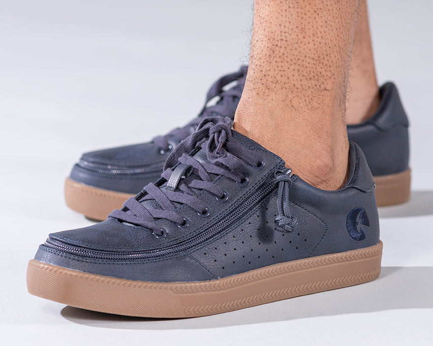 Men's Navy BILLY Sneaker Lows, zipper shoes, like velcro, that are adaptive, accessible, inclusive and use universal design to accommodate an afo. Footwear is medium and wide width, M, D and EEE, are comfortable, and come in toddler, kids, mens, and womens sizing.